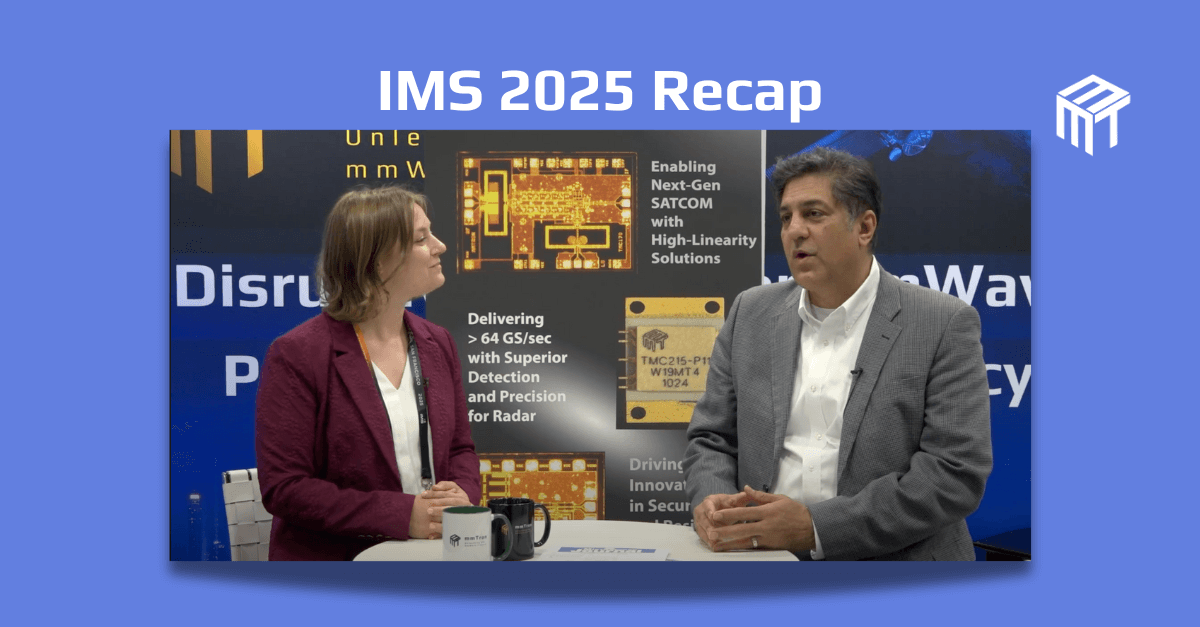 A photo of mmTron CEO Seyed A. Tabatabaei speaking with Microwave Journal Technical Editor Del Pierson at IMS in San Francisco