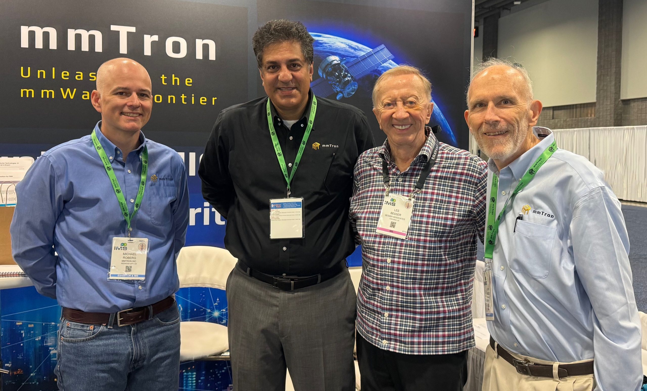 Les Besser in the mmTron booth with Mike Roberg, Seyed Tabatabaei, and Gary Lerude