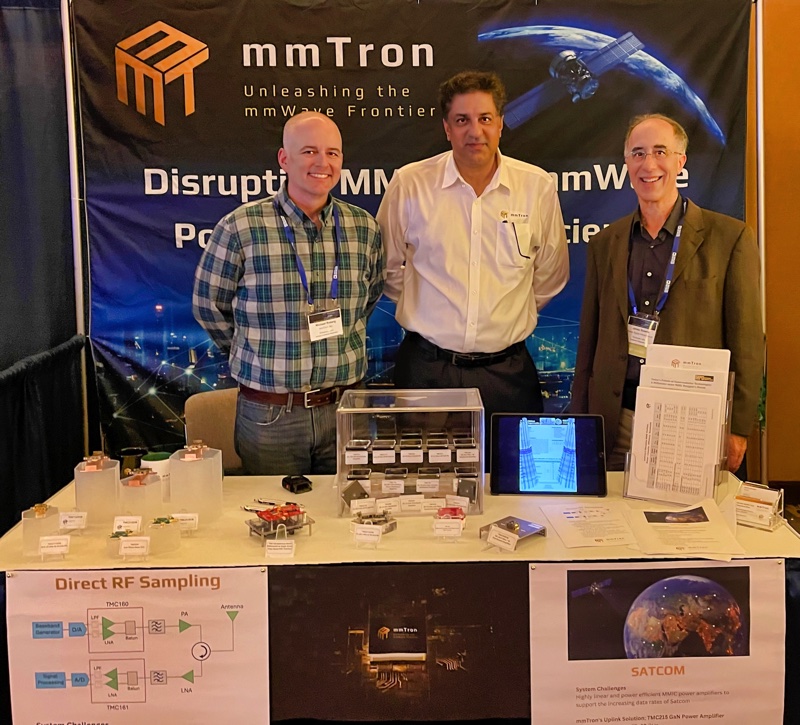 Photo of Mike Roberg, Seyed Tabatabaei, and Jim Sowers at the mmTron exhibit at the 2023 BCICTS conference in Monterey, Calif.