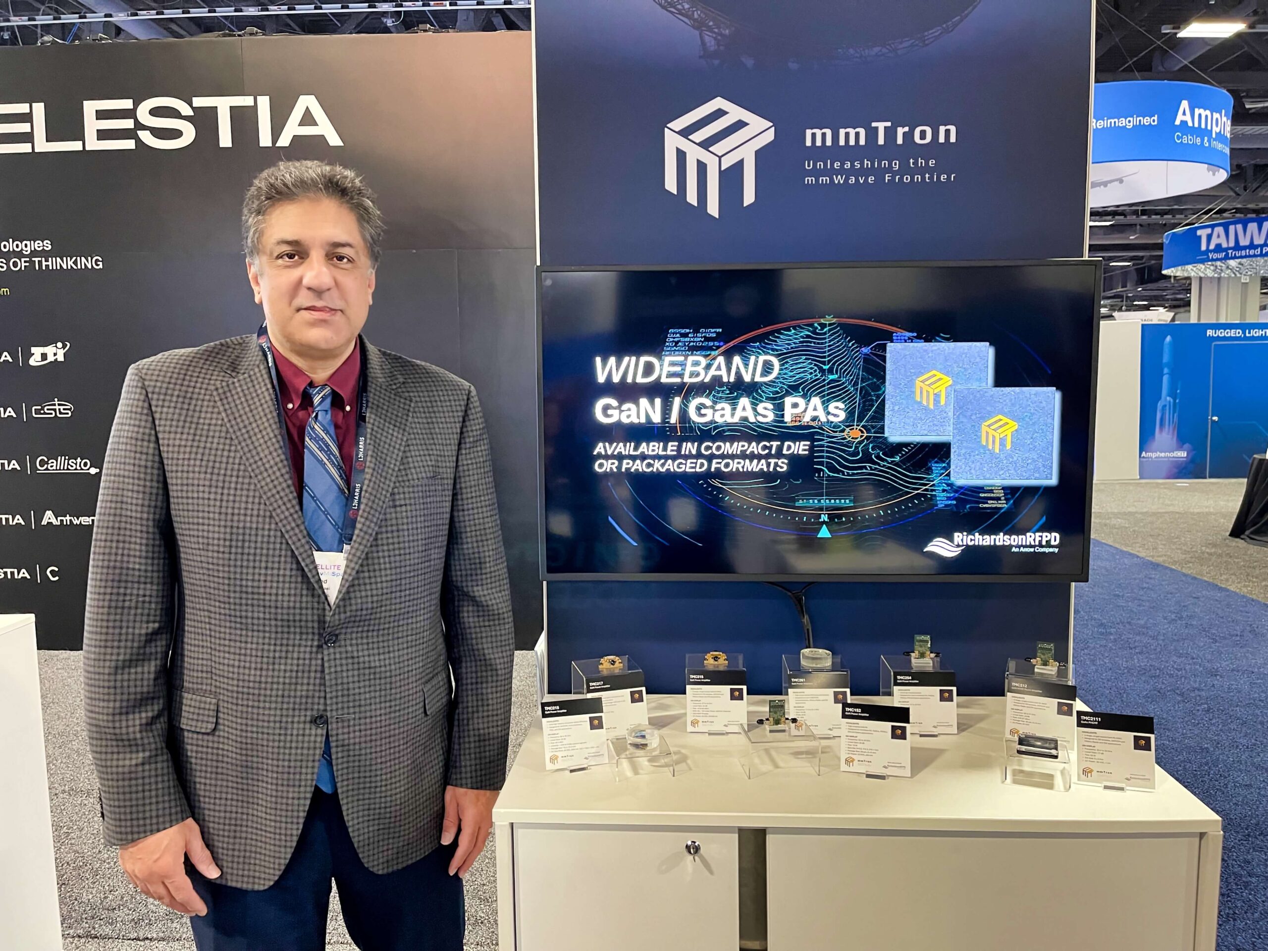 mmTron's CEO, Seyed Tabatabaei, with the company's products displayed at the Richardson RFPD booth at the SATShow Week conference in Washington, D.C.