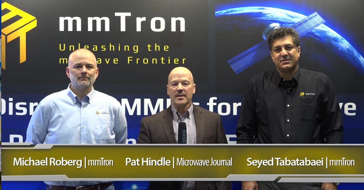 Photo of Pat Hindle (center) interviewing Mike Roberg (left) and Seyed Tabatabaei (right) at the mmTron booth at IMS2023 in San Diego.